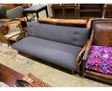 A Greaves &amp; Thomas mid century teak sofa bed, length 198cm, width 76cm, height 71cm