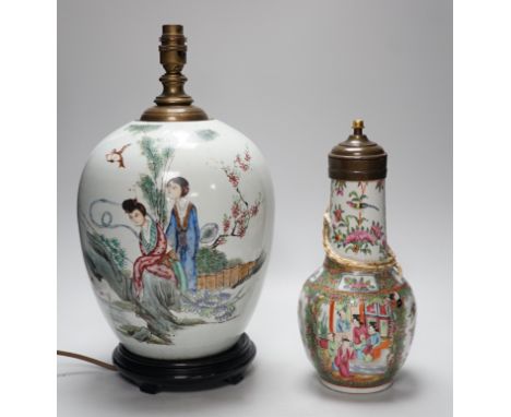 A Chinese famille rose vase converted to a lamp, 26cm, and a larger Chinese vase/lamp base, on stand, 41cm high