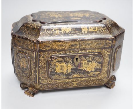 A 19th century Chinese chinoiserie lacquered sarcophagus form tea caddy, pewter lined interior with bone handles, 23cm