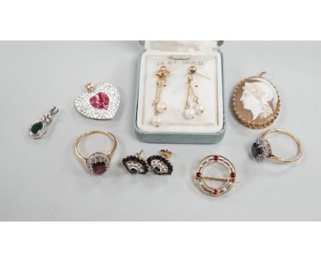 Mixed jewellery including two 9ct and gem set cluster rings and a 15ct, ruby and seed pearl set circular brooch, a yellow met