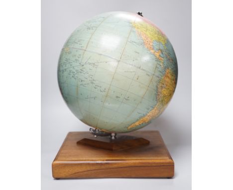 A Philips Challenge Globe, on stand, 46cm high, with atlas