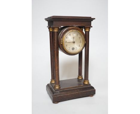 An Edwardian Portico-type mantel clock, 27cms high