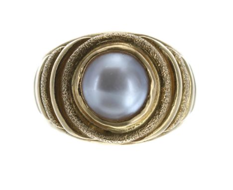 Yellow metal Mabe pearl set ring, marked '21k', width 18mm, 12.4gm, ring size V/W 