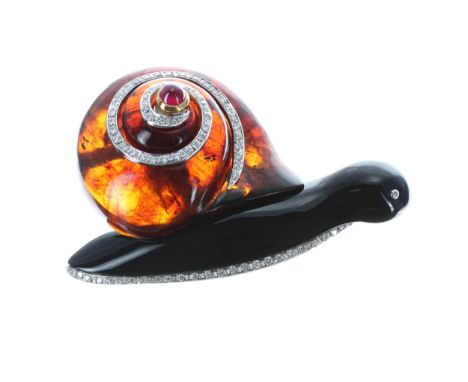 Unusual 18ct mounted amber and diamond snail design brooch, set with a cabouchon ruby, 31.1gm, 57mm (4035) 