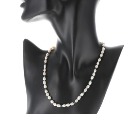 Cultured pearl and emerald necklace with an 18k ball clasp, the pearls 5.5mm, 14.7gm, 16" long 