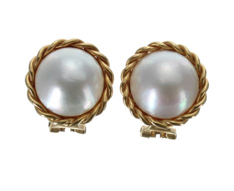 Pair of Mabe pearl earrings in an 18ct yellow gold rope twist setting, 8.7gm, 16.5mm diameter