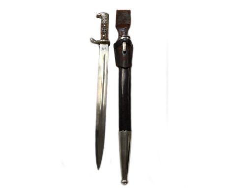 A military dress bayonet featuring emblems for Nazi Germany police with scabbard and frog