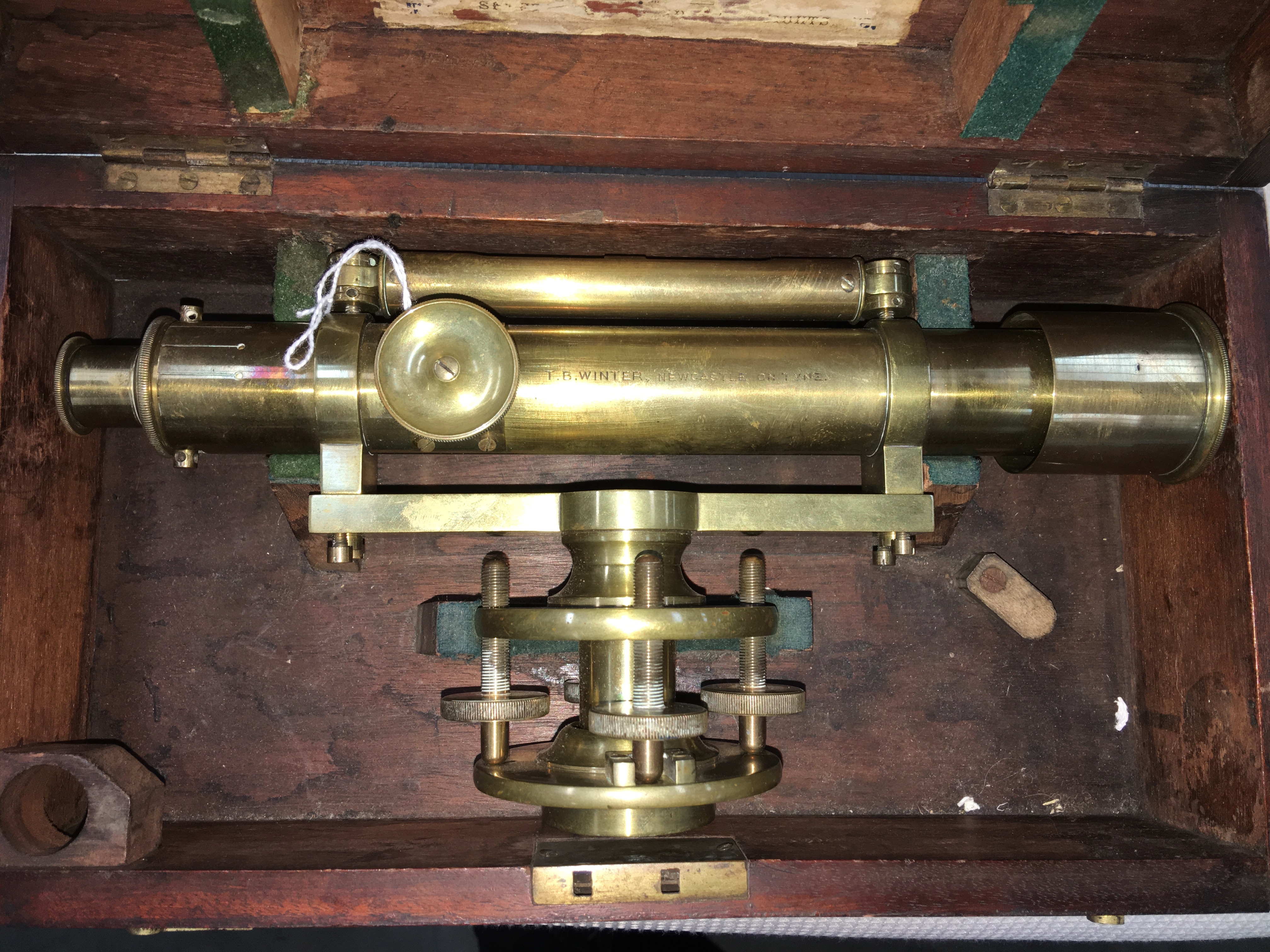 A cased brass telescope marked T B Winter, Newcastle Upon Tyne