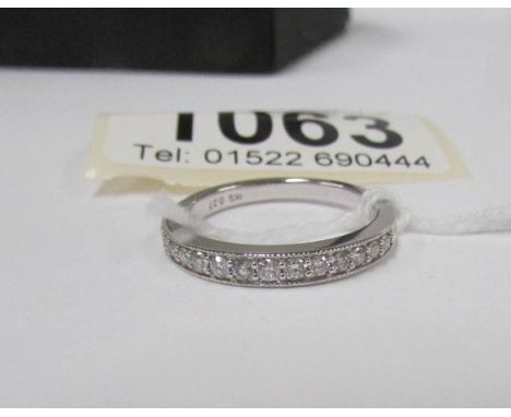 An 18kt white gold milligrain ring set with 14 diamonds, approximate size M