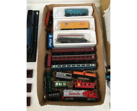 A quantity of 00/H0 engines and rolling stock including Bachmann, Lima, Hornby etc