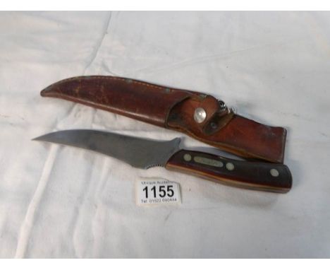 A Schrade 'Old Timer' 150T hunting knife with scabbard