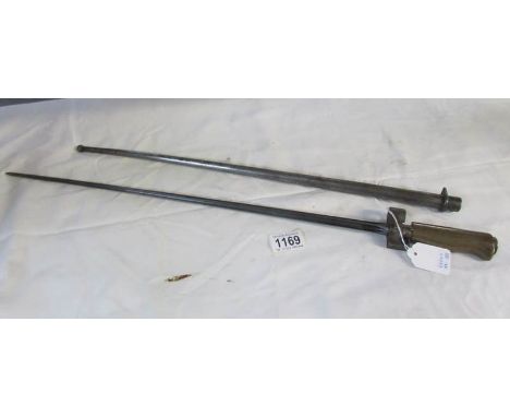 A French bayonet with cruciform blade and scabbard (number worn on scabbard)