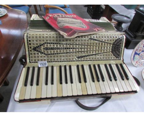 A cased Septimmio Soprani piano accordion