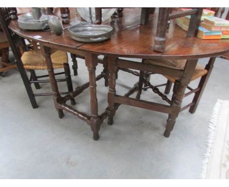 A period oak gate leg table
