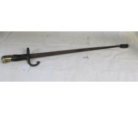 A French model 1874 'Gras' sword bayonet marked on the back edge Mre D'Armes De St. Etienne Juillet 1877