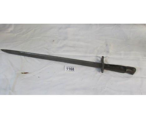 A Remington bayonet (markings mostly worn)