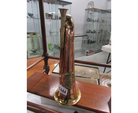 A copper bugle with brass badge for Sutherland and Argylland