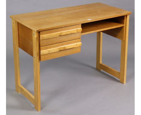 A light oak knee-hole desk fitted two long drawers to the left-hand side, &amp; on square supports, 39¾” wide x 29½” high. 