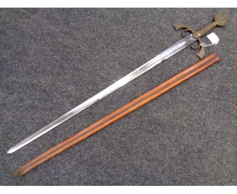 A Medieval style sword in leather scabbard