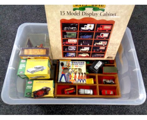 A box of two die cast model display stands, assorted boxed and un-boxed cars, rolling stock etc 