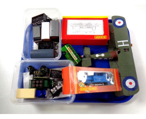 A tray of boxed Hornby locomotive R2960, further unboxed rolling stock, model of a bi-plane etc 