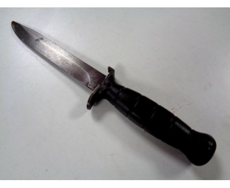 A 1970's West German fighting knife, lacks scabbard 