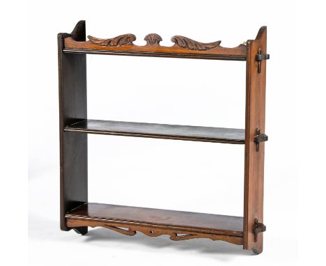 Comprising three open shelves, surmounted by a shaped three-quarter gallery, the bottom shelf above a pierced apron61,5cm hig