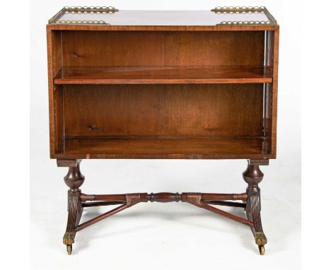 The rectangular top surmounted by a broken box brass gallery, each open compartment below with an adjustable shelf, the sides