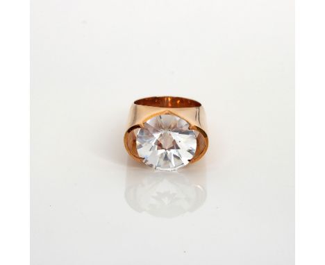 Centred with a round fancy-cut white gem, possibly topaz, impressed maker's mark HaH and 585, in 14ct gold, ring size K