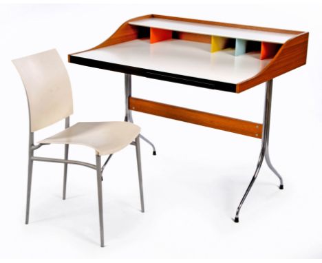 A LAMINATE AND STEEL HOME DESK, DESIGNED IN 1958 BY GEORGE NELSON FOR VITRAThe rectangular top surmounted by a gallery compri