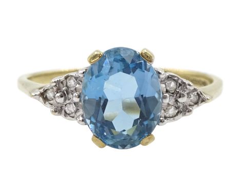 9ct gold oval blue topaz and diamond ring, hallmarkedCondition Report:Approx 2.25gm, size R-S