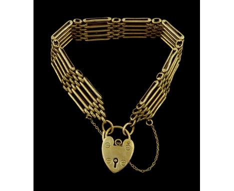 9ct gold five bar gate bracelet, with heart locket clasp, hallmarkedCondition Report:Approx 29.4gm