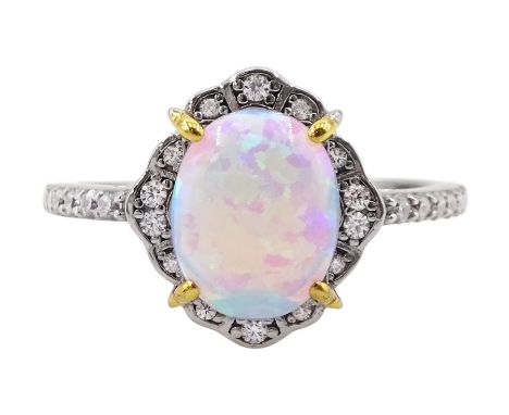 Silver opal and cubic zirconia cluster ring, stamped 925Condition Report:Size R