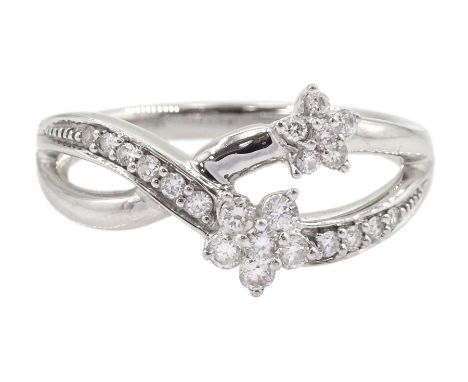 18ct white gold round brilliant cut diamond flower crossover ring, hallmarkedCondition Report:Approx 3.55gm, size M, good con