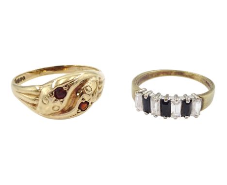 Gold garnet crossover snake ring, Birmingham 1951 and a gold cubic zirconia ring, both hallmarked 9ctCondition Report:Approx 