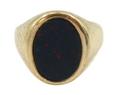 9ct gold oval bloodstone signet ring, Birmingham 1990Condition Report:Approx 8.75gm, size R-S, max head depth = 18.6mm, shank