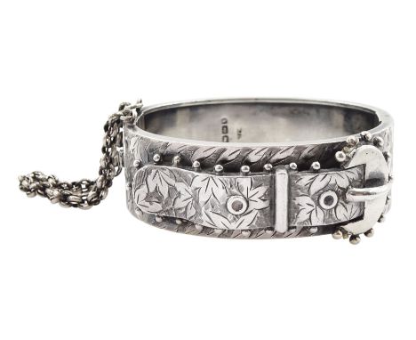Victorian silver buckle hinged bangle, with bright cut leaf decoration by Robert James Dick, Birmingham 1884Condition Report: