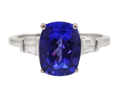 18ct gold cushion cut tanzanite ring, with tapered baguette cut diamond shoulders, hallmarked, tanzanite approx 3.90 caratCon