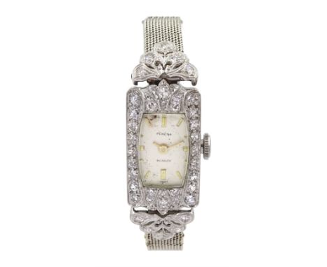 Art Deco ladies platinum diamond set wristwatch, the rectangular bezel and articulated lugs, milgrain set with old cut diamon