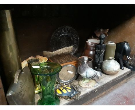 Shelf of items inc. shell cases, wooden items, and misc. 