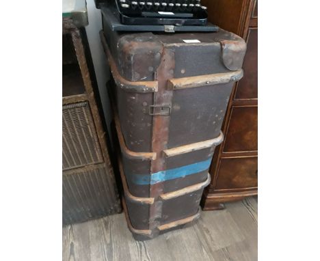 A vintage trunk and contents. 