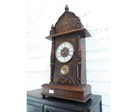 A mantle clock, height 72cm. 