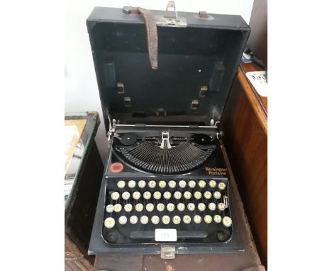 A Remington Portable vintage typewriter and case. 