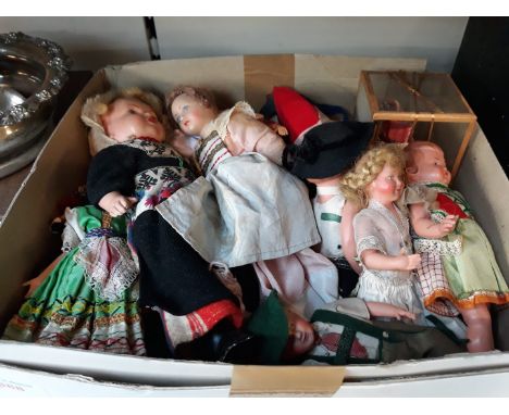 A box of vintage dolls 