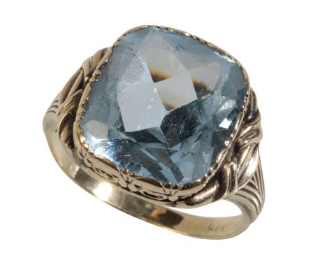 AN "AQUAMARNE" DRESS RING the square facet-cut aquamarine (not tested) on a shank stamped '333' for 8ct, with shaped shoulder