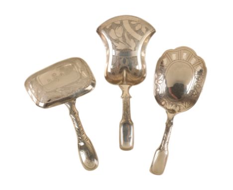 THREE GEORGE III SILVER FIDDLE PATTERN CADDY SPOONS all with leaf engraved bowls, two by John Thropp or Joseph Taylor, the ot