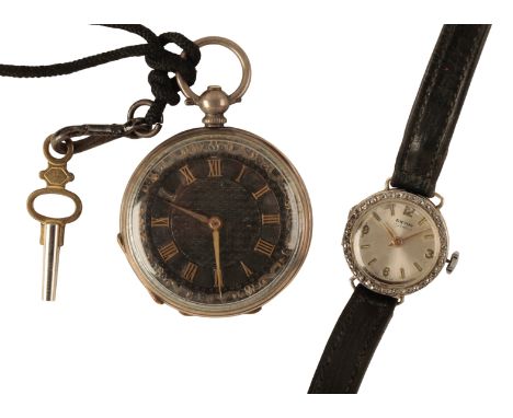ENVOY: AN 18CT WHITE AND YELLOW GOLD  &amp; DIAMOND LADY'S COCKTAIL WATCH with manual wind movement, the silver dial with gol