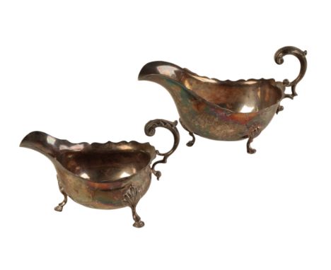 TWO GEORGE V SILVER SAUCE BOATS one by Lee &amp; Wigfull, Sheffield 1925, the other by Hamilton &amp; Co, London 1936, combin