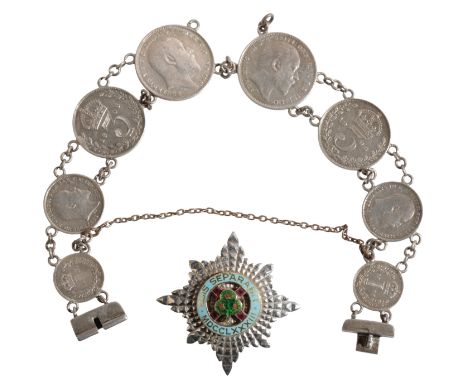 AN IRISH GUARDS SWEETHEART BROOCH the enamel inscribed " QUIS SEPARABIT MDCCLXXX111", on unmarked white and yellow metal, the
