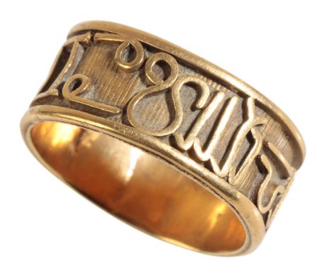 AN UNMARKED YELLOW METAL ZODIAC RING the ribbed band with raised zodiac signs throughout, ring size Q